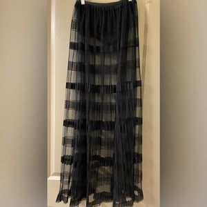 Size S Dance & Marvel see through skirt with attached bottom.